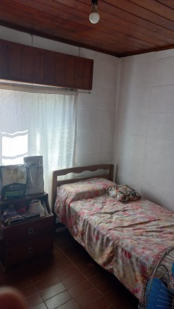 (AUT. 398) VENDO HERMOSA CASA DE MATERIAL CON TERRENO EN BARRIO LOMAS DE MORENO