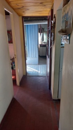 (AUT. 398) VENDO HERMOSA CASA DE MATERIAL CON TERRENO EN BARRIO LOMAS DE MORENO