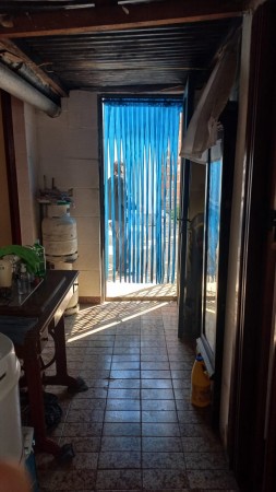 (AUT. 398) VENDO HERMOSA CASA DE MATERIAL CON TERRENO EN BARRIO LOMAS DE MORENO