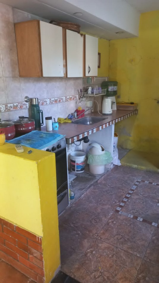 OFERTA IMPERDIBLE PARA INVERSIONISTA O FAMILIA NUMEROSA, VENDO HERMOSA CASA DE MATERIAL TOTALMENTE TERMINADO DE APROXIMADAMENTE 190 M2 CUBIERTO