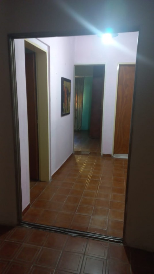 OFERTA IMPERDIBLE PARA INVERSIONISTA O FAMILIA NUMEROSA, VENDO HERMOSA CASA DE MATERIAL TOTALMENTE TERMINADO DE APROXIMADAMENTE 190 M2 CUBIERTO