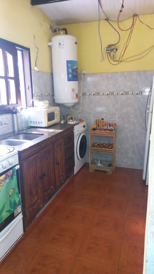 VENDO HERMOSA PROPIEDAD CON TERRENO EN MORENO NORTE, A 40 METROS DE RUTA 23, PROXIMO A COLEGIO, COMERCIOS ESTACIONES DE SERVICIOS
