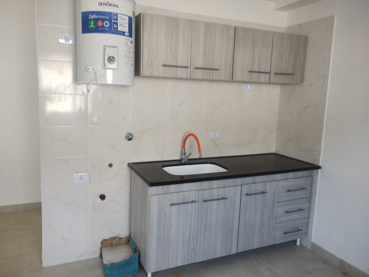 ALQUILO REGIO DEPARTAMENTO CON COCHERA, PLANTA BAJA EN MORENO CENTRO, EDIFICIO MADIBA VII,  CALLE DE LA QUINTANA 270 -MORENO